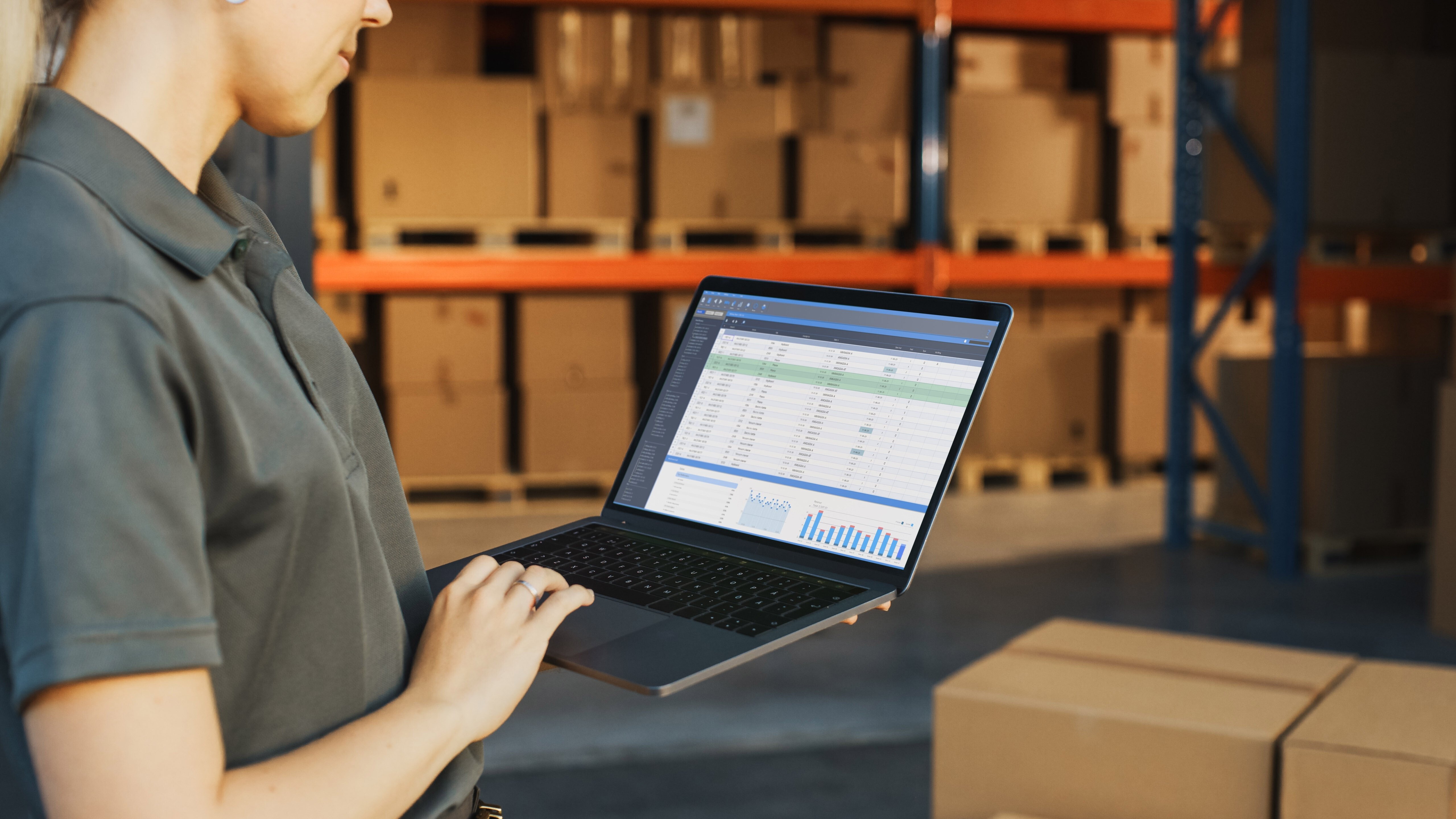 female-manager-using-laptop-computer-check-inventory-background-warehouse-retail-center-with-cardboard-boxes-ecommerce-online-orders-food-medicine-products-supply-shoulder