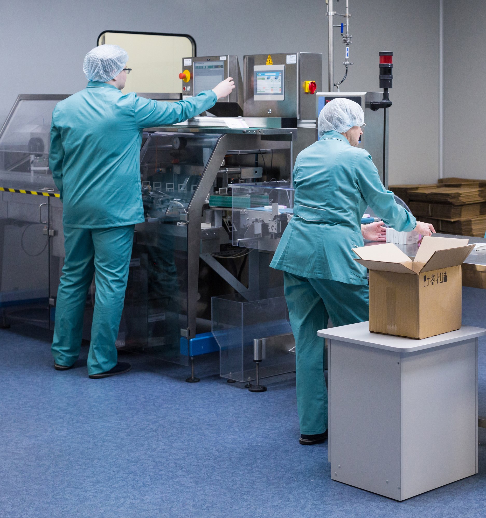 pharmaceutical-technicians-work-sterile-working-crop-pharmaceutical-factory-scientists-wearing-protective-clothing (2)