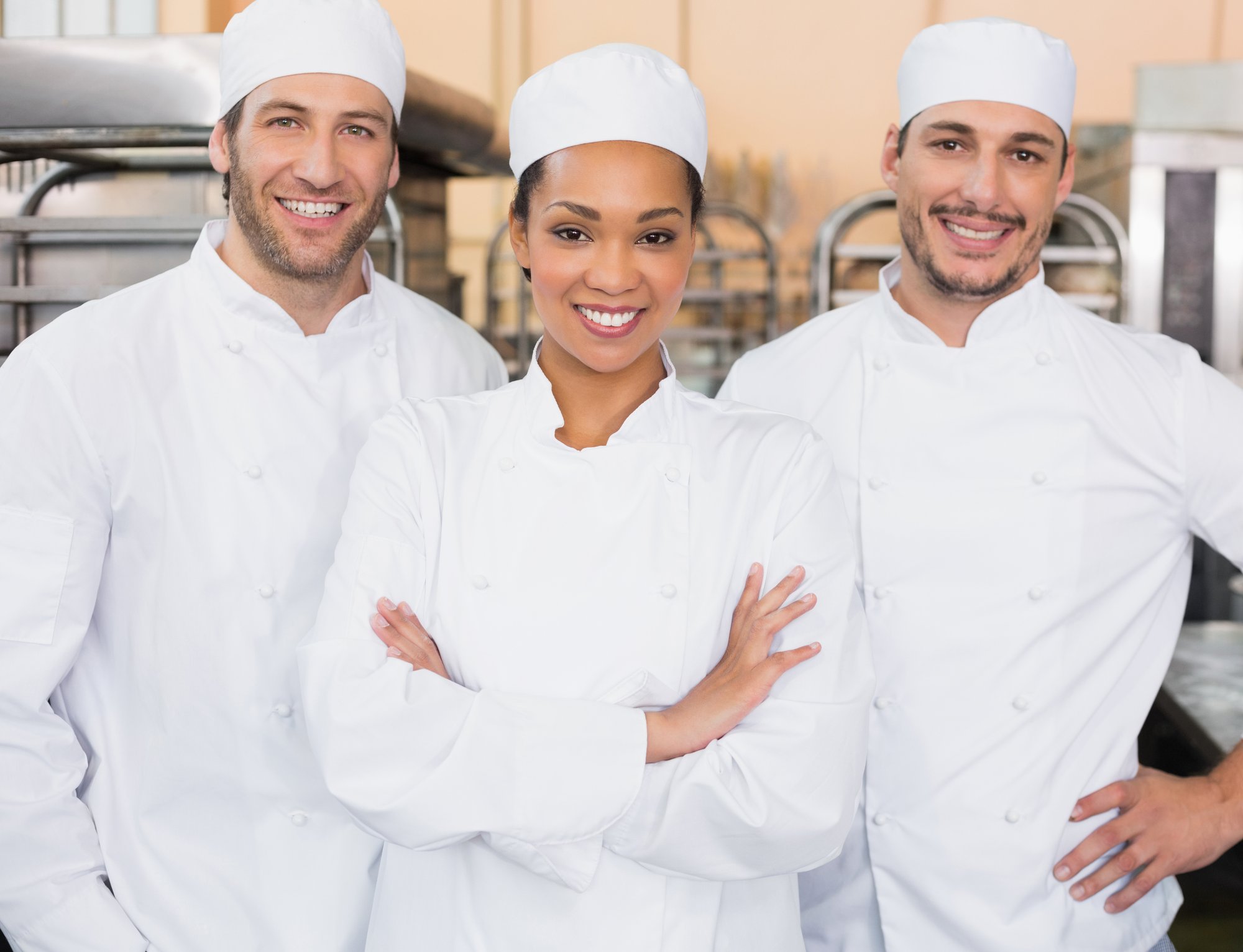 team-bakers-smiling-camera crop