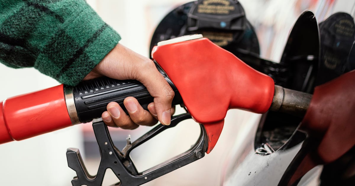 Man pumping diesel fuel